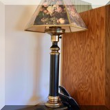 DL28. Black and gold table lamp with hurricane.